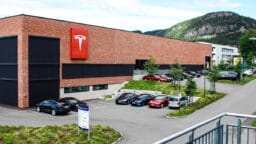 cars parked beside building during daytime