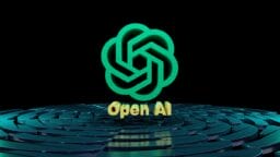 A 3D OpenAI logo in green hovers above the words Open AI on a circular, blue pattern against a black background.