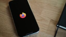 A close up of a cell phone on a table