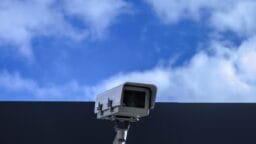 white security camera at daytime