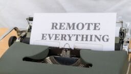 a close up of a typewriter with a paper that reads remote everything