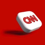 a white dice with the word cnn on it