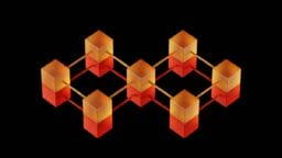 Eight orange-red cubes are connected by yellow rods in a geometric network, displayed on a black background.