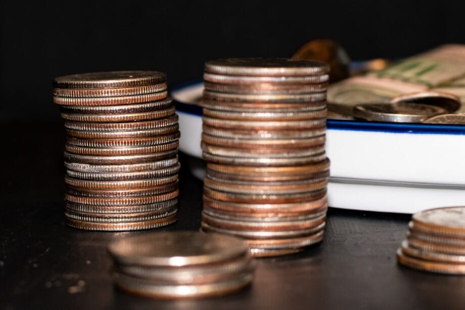 a pile of coins sitting on top of a table