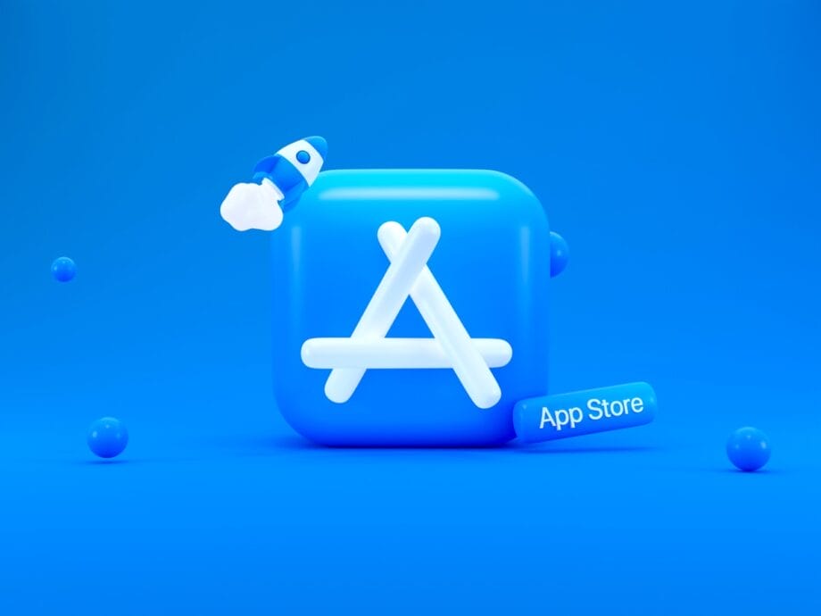 3D icon of the App Store logo with a small rocket and a blue pill-shaped label reading App Store on a blue background.