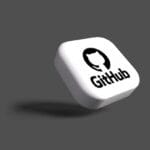 a white dice with a black github logo on it