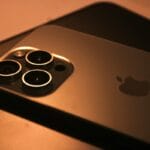 a close up of a cell phone on a table