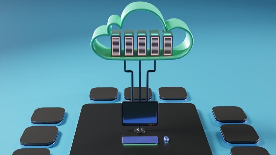 A 3D illustration of cloud computing, showing servers in a cloud connected to a desktop computer with peripheral devices.