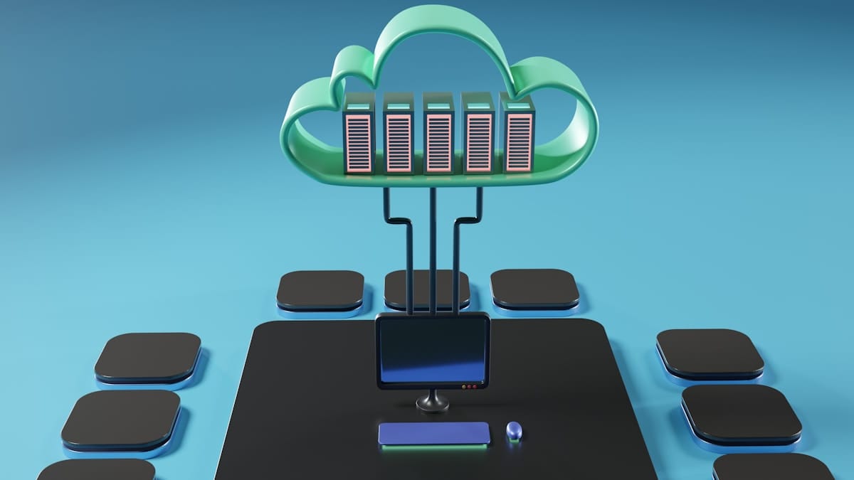 A 3D illustration of cloud computing, showing servers in a cloud connected to a desktop computer with peripheral devices.