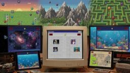 A desktop setup with multiple screens displaying various pixel art Minesweeper games and themes, including space, ocean, and maze backgrounds.