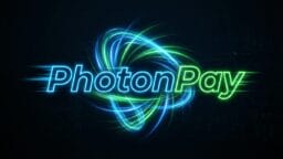 PhotonPay logo with blue and green glowing lines forming a dynamic swirl around the text on a dark background.