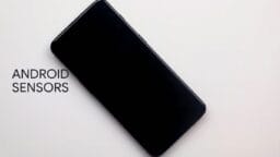 A black smartphone on a white background with the text ANDROID SENSORS on the left side.