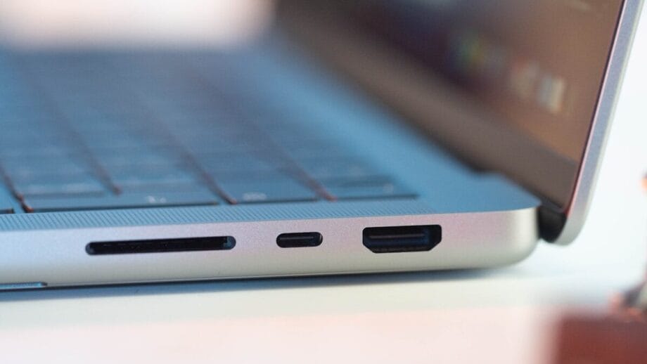 Close-up of a laptop’s side ports, including an SD card slot, USB-C port, and HDMI port.