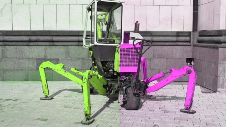 A pink and black picture of a pink tractor