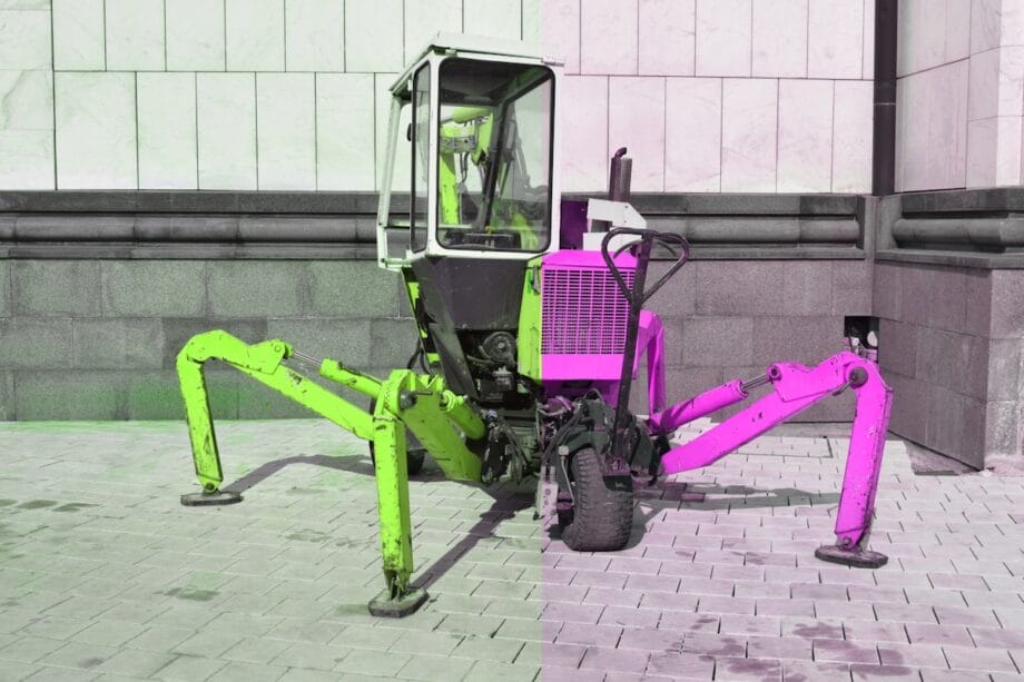 A pink and black picture of a pink tractor