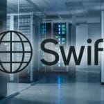 A server room with racks of computer hardware, overlaid by the SWIFT logo featuring a globe and the word Swift.