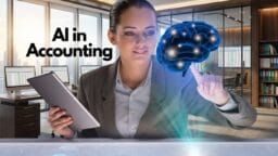 Businesswoman in office interacts with a digital brain hologram, holding a tablet, with the text AI in Accounting beside her.