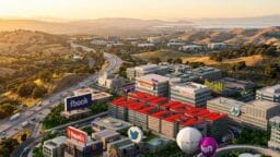 A digital illustration of Silicon Valley featuring office buildings with logos of major tech companies and surrounding hills in the background.