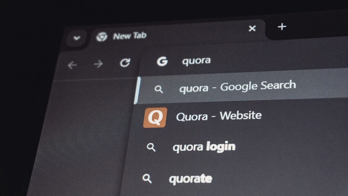 A computer screen showing a web browser with quora entered in the search bar and related search suggestions below.