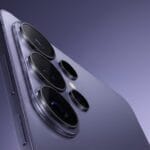 Close-up of the rear camera lenses and side buttons on a modern smartphone with a metallic finish, set against a gradient background.