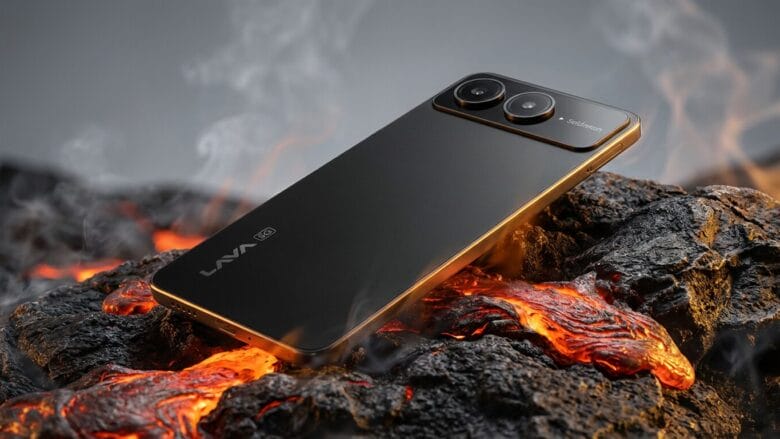 A black Lava 5G smartphone rests on top of hot, glowing lava rocks with steam rising around it.