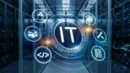 A digital graphic with IT at the center, surrounded by technology icons, is overlaid on a server room background.