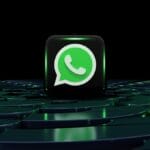 A 3D WhatsApp logo cube sits on a dark, glowing, circular platform with green highlights against a black background.